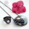 Naszyjniki srebrny wisior z motywem warkocza i perłą